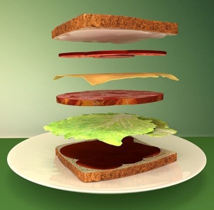 Sandwich with stacked ingredients.