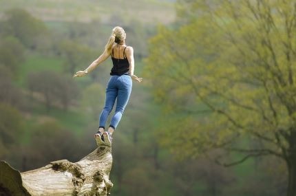 What is a nootropic - Woman balancing on log.