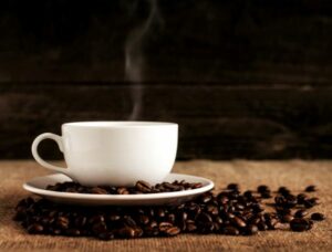 Does Caffeine Help with Focus - Steaming Cup of Coffee