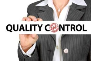 What's the Best Nootropic for Athletes - Business Woman Holding Quality Control Sign