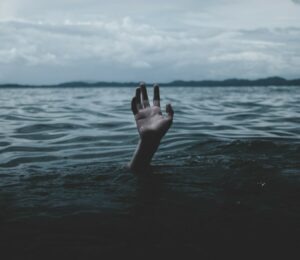 Is L-Theanine Good for Social Anxiety? - Person Drowning in Water