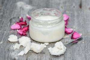 How does CoQ10 Benefit the Brain - Coconut Oil on a Table