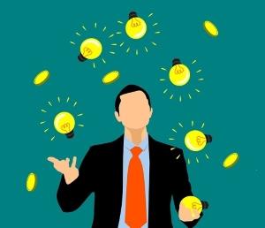 How does CoQ10 Benefit the Brain - Man Juggling Light Bulbs and Coins