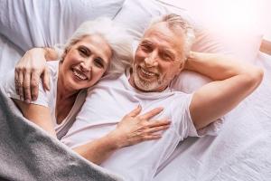 How does CoQ10 Benefit the Brain - Senior Couple in Bed