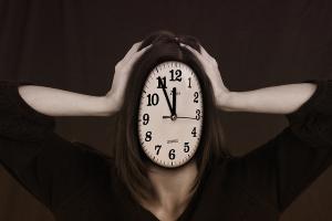 How does CoQ10 Benefit the Brain - Woman with Clock over her Face