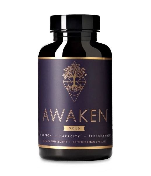 Bottle of Awaken Gold nootropic supplement.